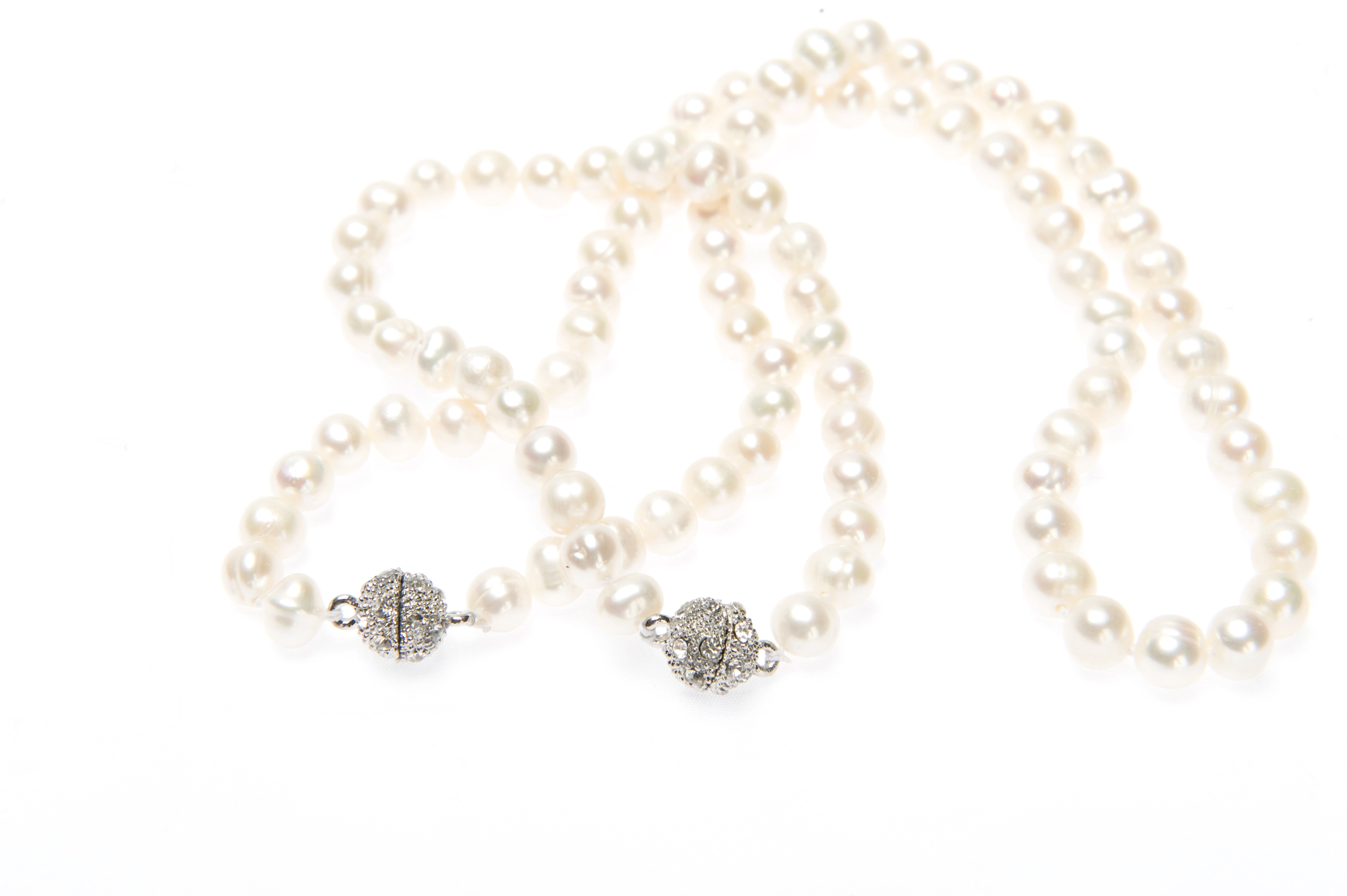 Pearl necklaces with interchangeable necklace system | Clasped — Clasped